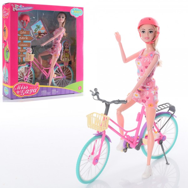 130359 Лялька 51809 шарнірна, велосипед, шолом, кор., 29-32-8 см.