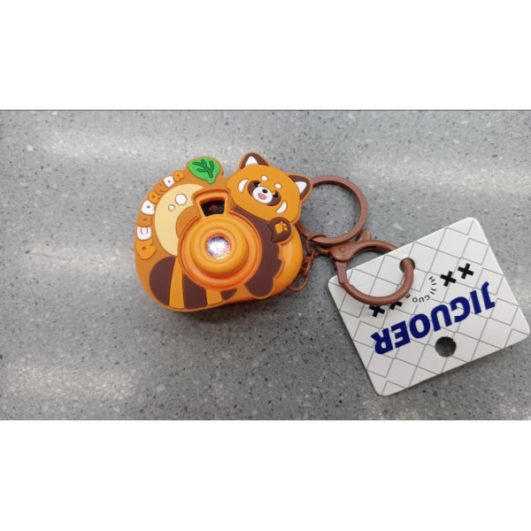 221721 Брелок FG241025073 на сумку, фотоапарат, змінюються картинка, світло, бат.(табл.),хедер/кул.,6-6-3см